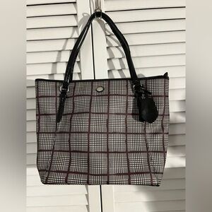 Free COACH bag with purchase of bag tag